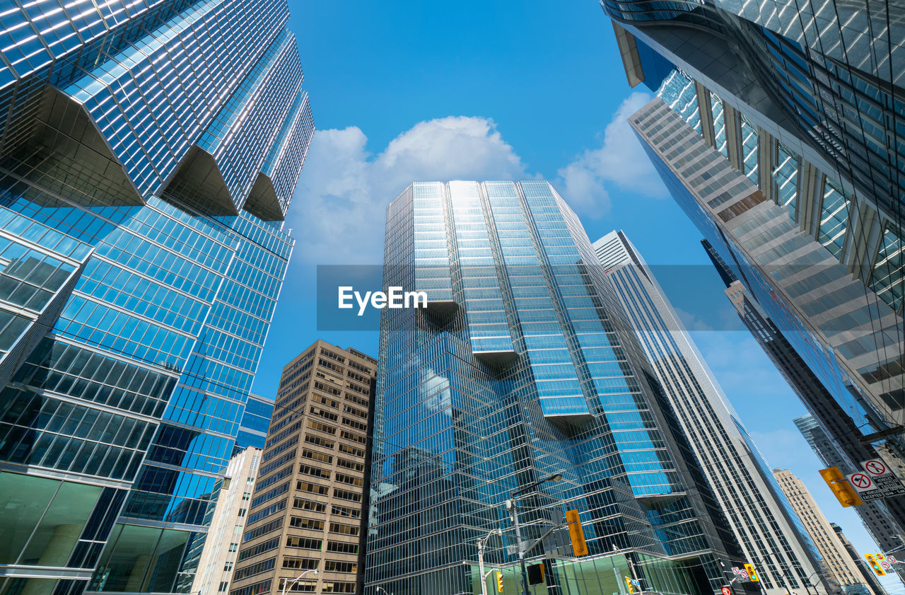 LOW ANGLE VIEW OF BUILDINGS AGAINST SKY