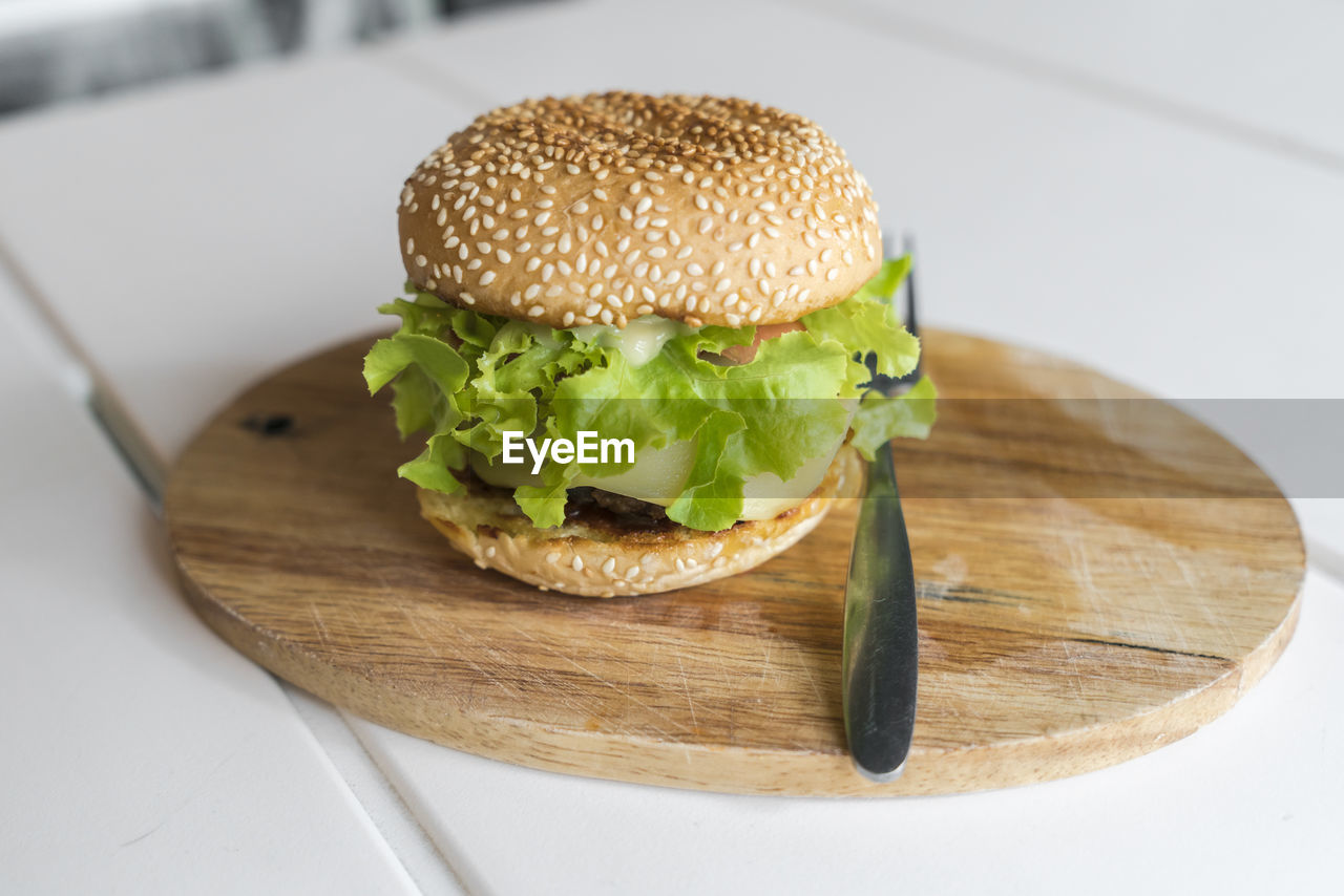 Close-up of burger in plate on table