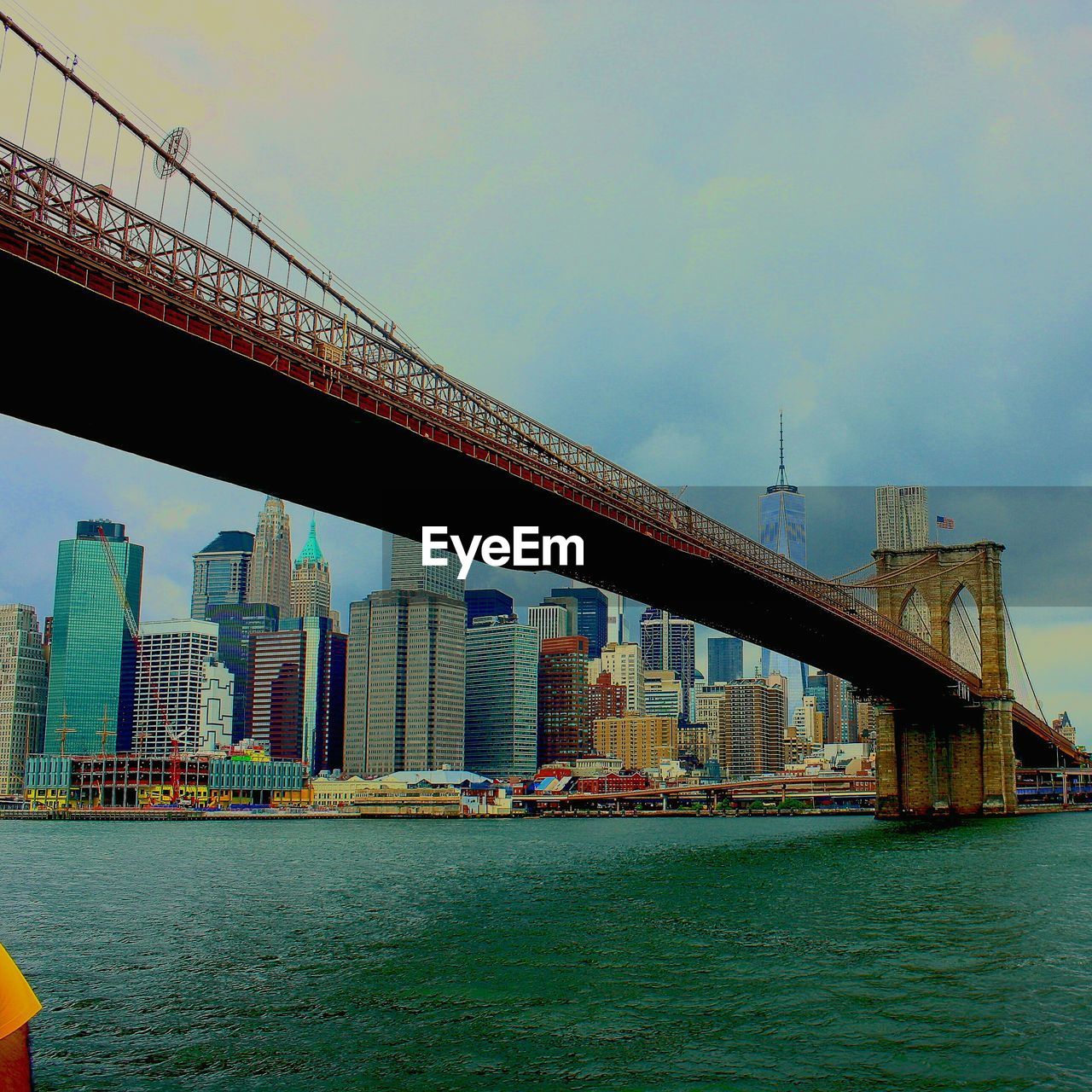 VIEW OF BRIDGE OVER RIVER IN CITY