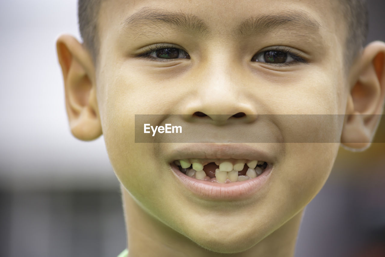 CLOSE-UP PORTRAIT OF BOY