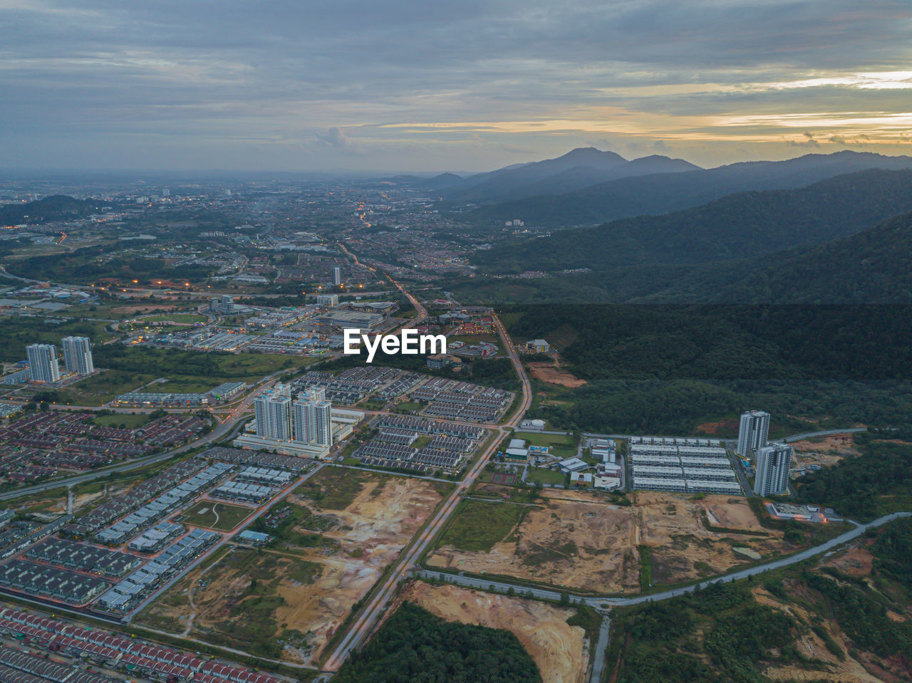 Aerial panoramic view of cityscape and new residential area in meru, perak, malaysia.