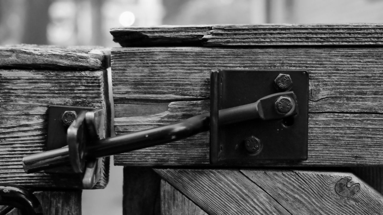 Close-up of lock on wood