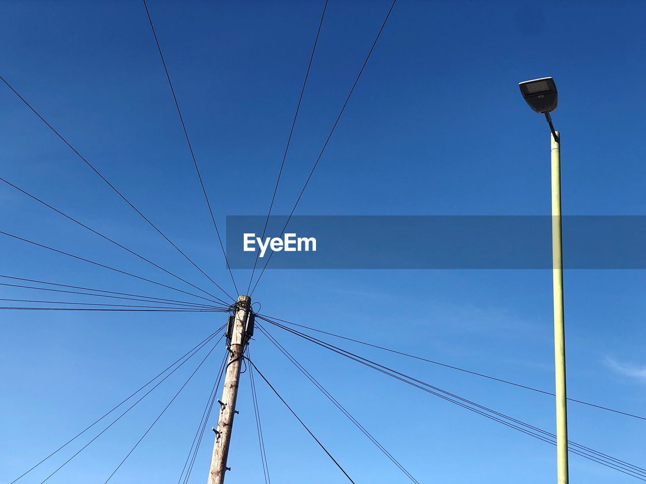 LOW ANGLE VIEW OF STREET LIGHT AGAINST CLEAR SKY