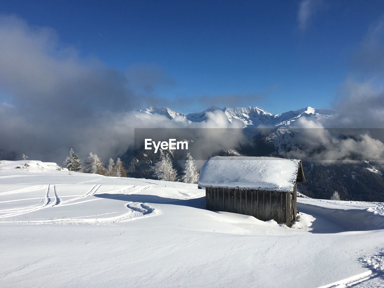 Snow covered mountain against sky