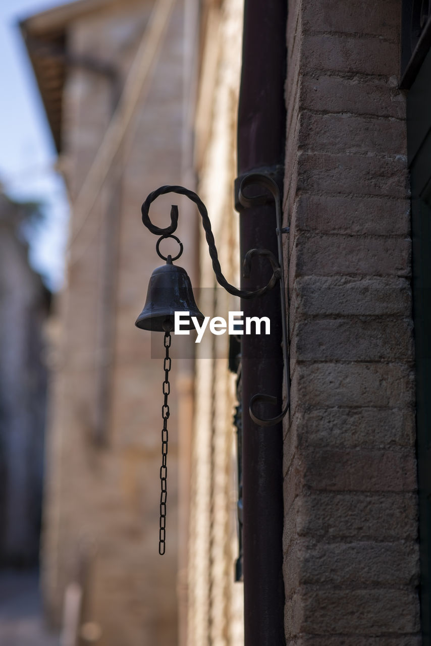 Ancient bell in the streets of the village in italy