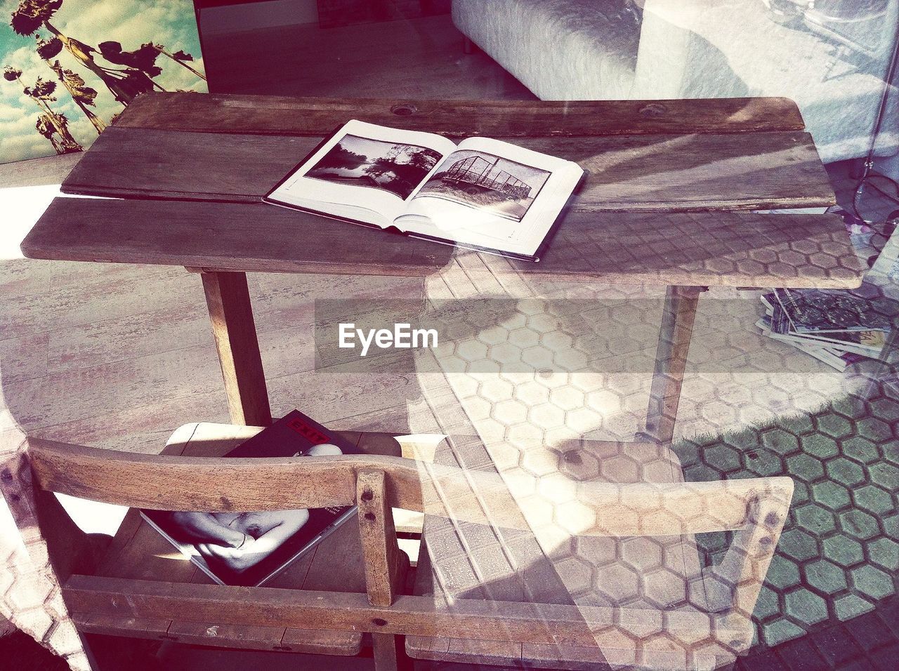 Open magazine on wooden table