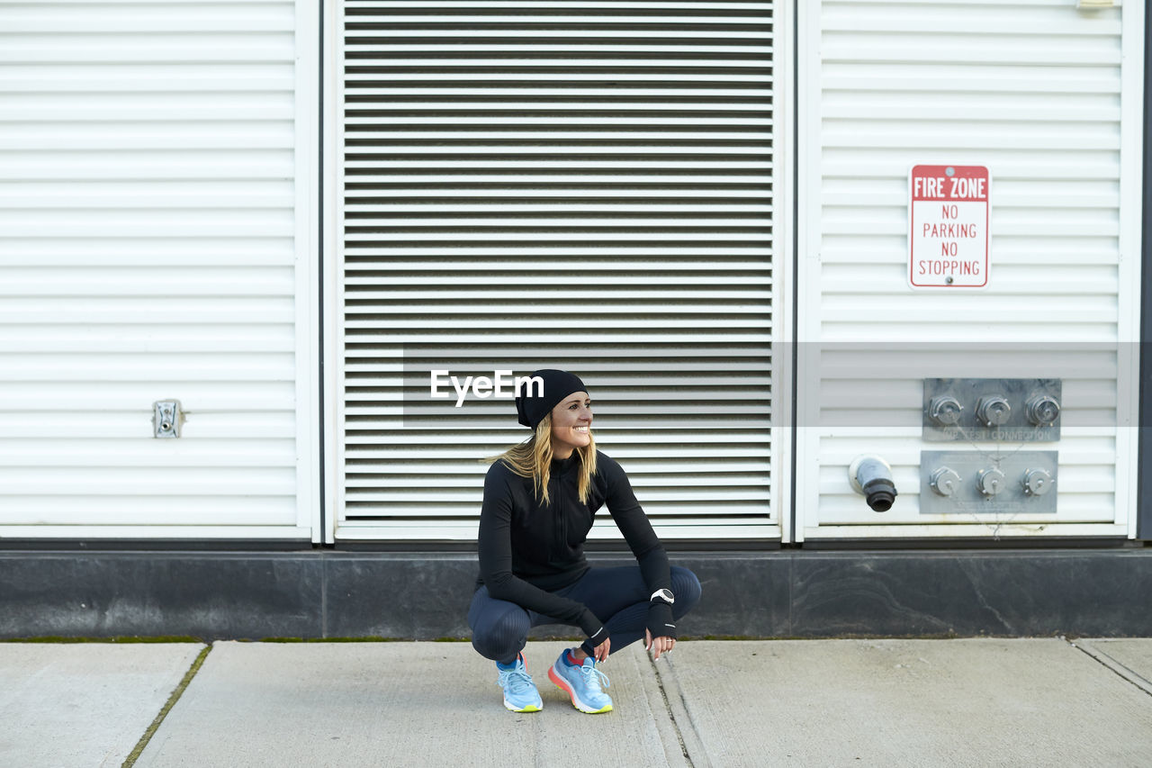 Outdoor portrait of an athletic woman.