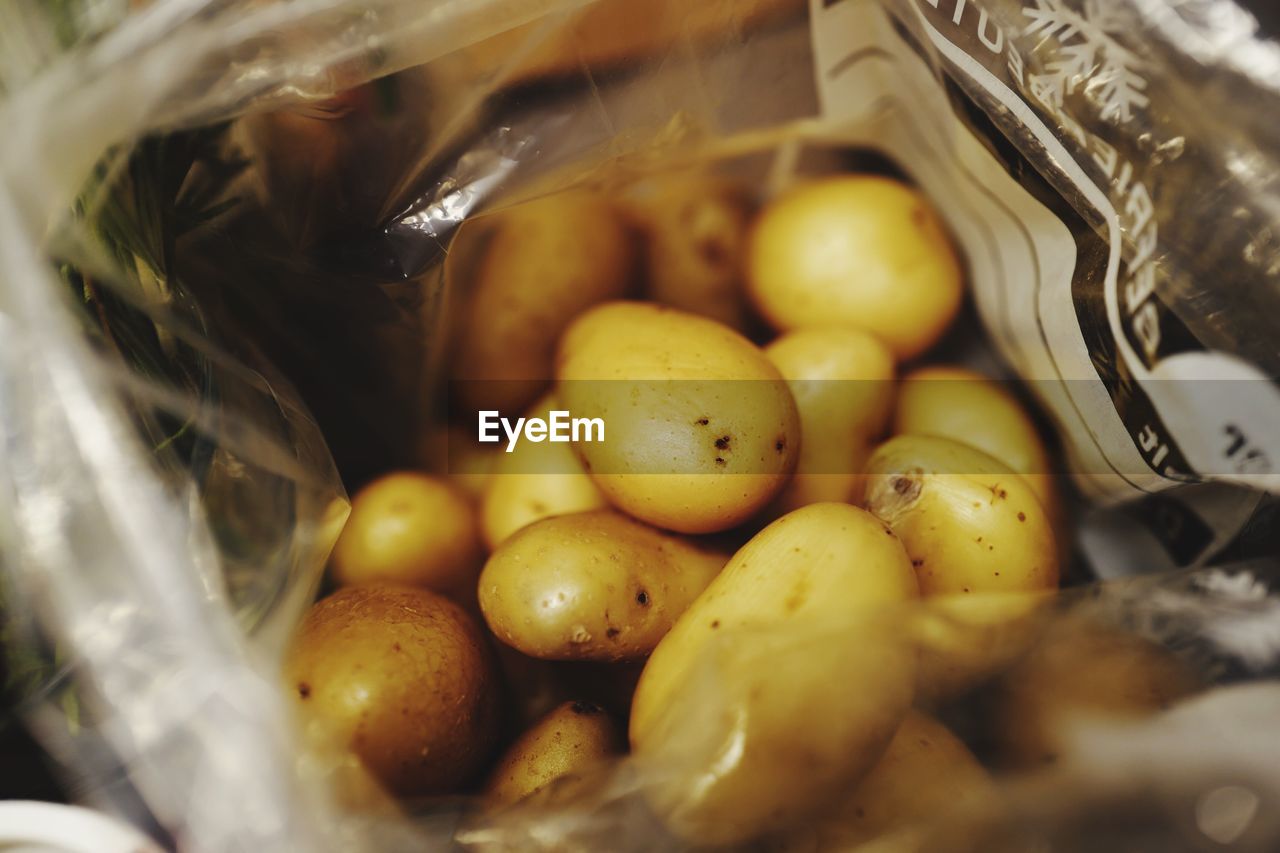 High angle view of potatoes in plastic bag