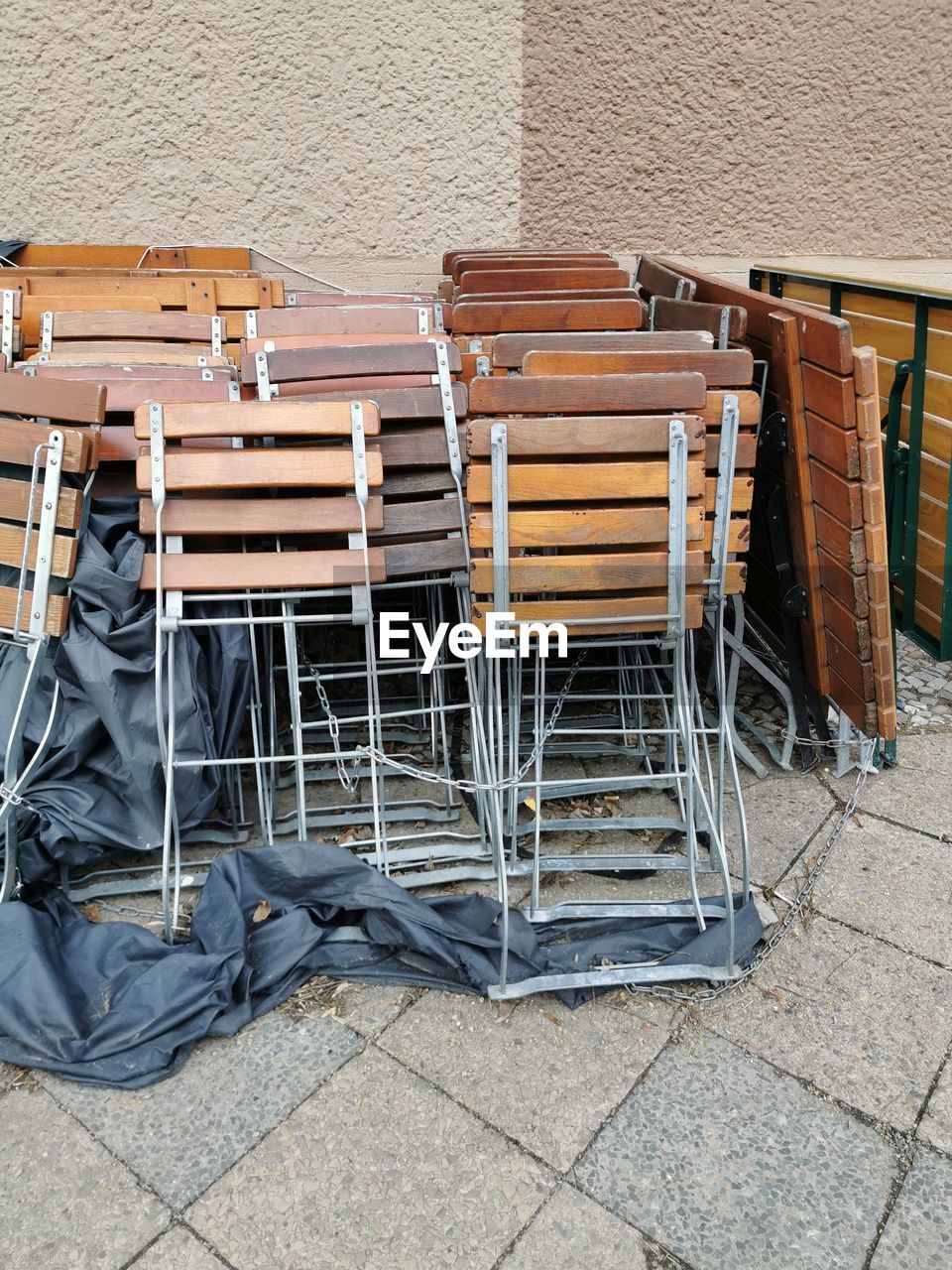 HIGH ANGLE VIEW OF CHAIRS ON WALL