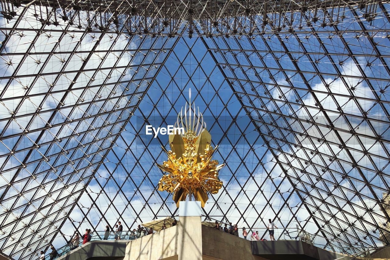 Low angle view of sculpture at musee du louvre