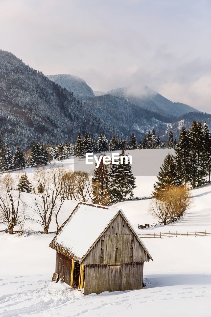 Snow covered mountain against sky