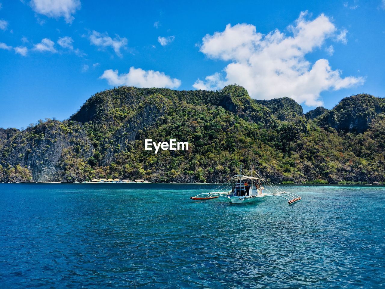 View of boat over sea against sky