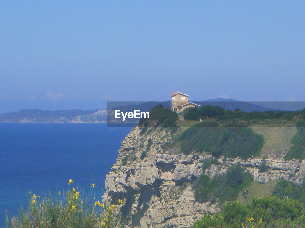 SCENIC VIEW OF SEA AND MOUNTAINS