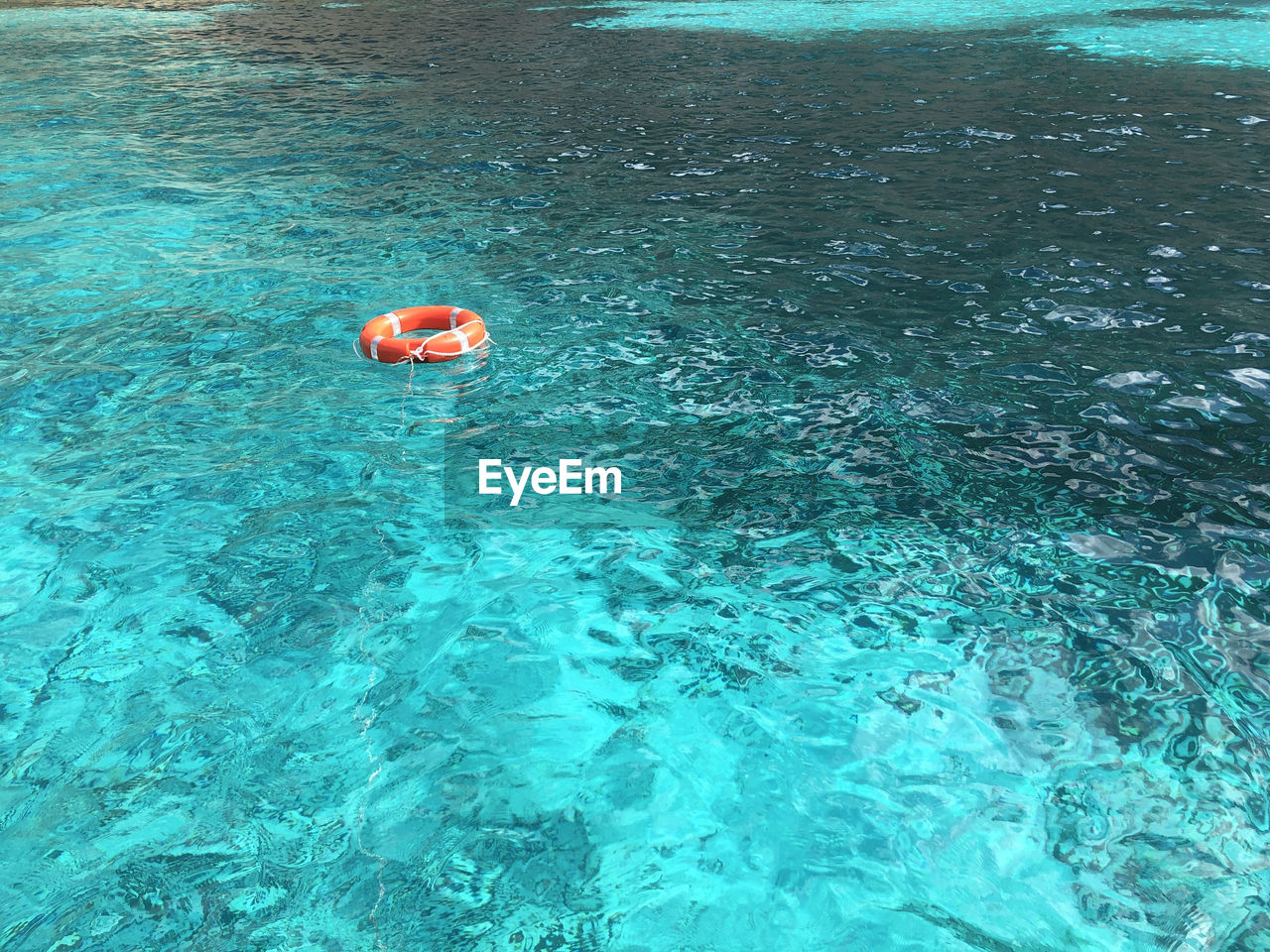 High angle view of inflatable ring in sea