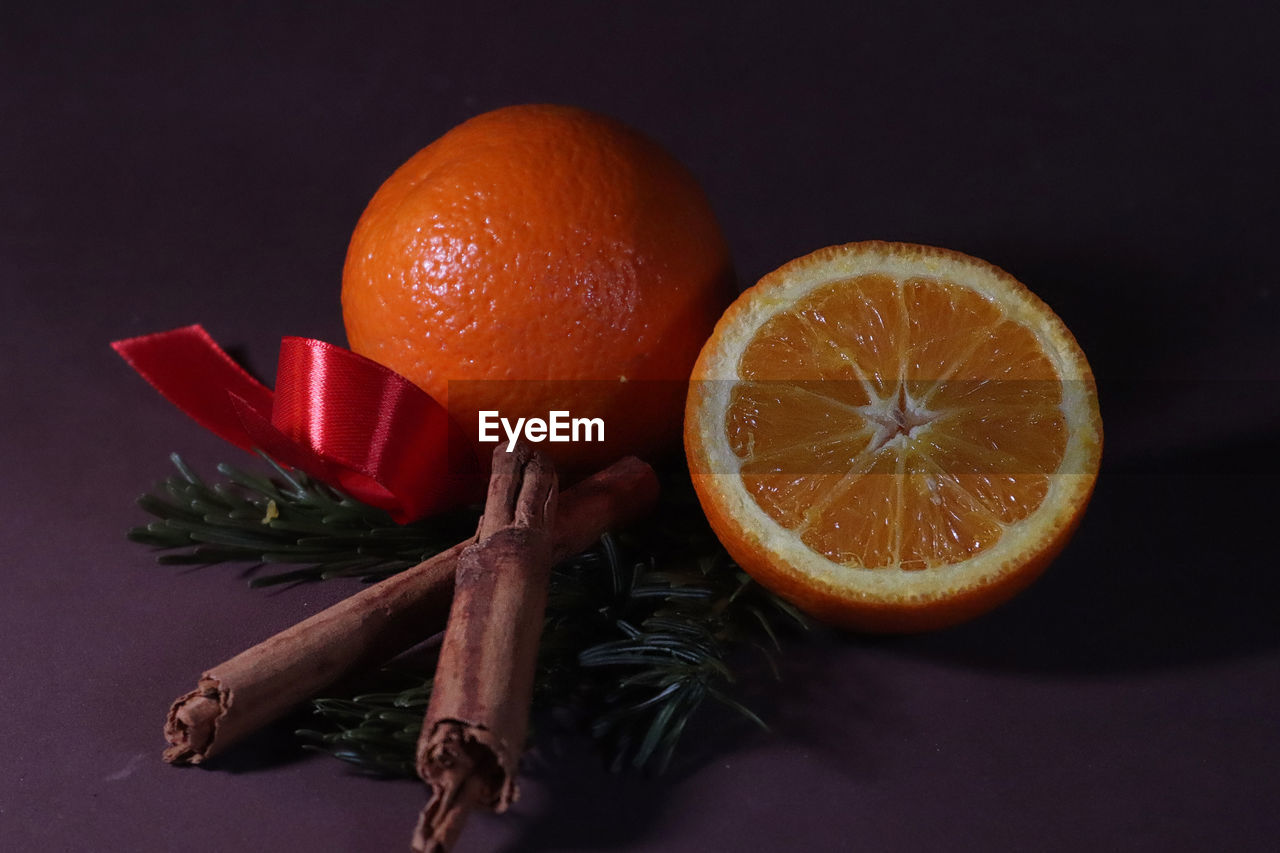 food and drink, food, healthy eating, fruit, citrus fruit, wellbeing, freshness, orange, orange color, studio shot, tangerine, plant, grapefruit, indoors, no people, still life, black background, blood orange, produce, slice, cross section, clementine, ingredient, citrus, bitter orange, lemon, organic