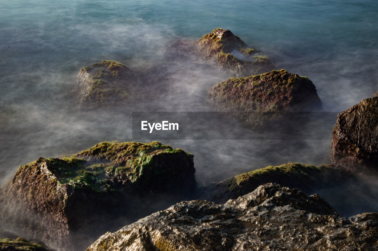 Scenic view of sea and rocks