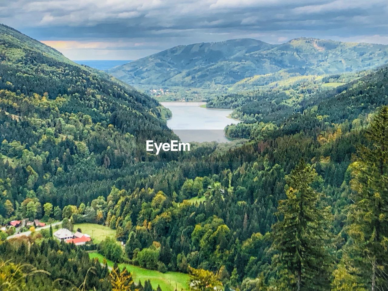 High angle view of trees and mountains against sky