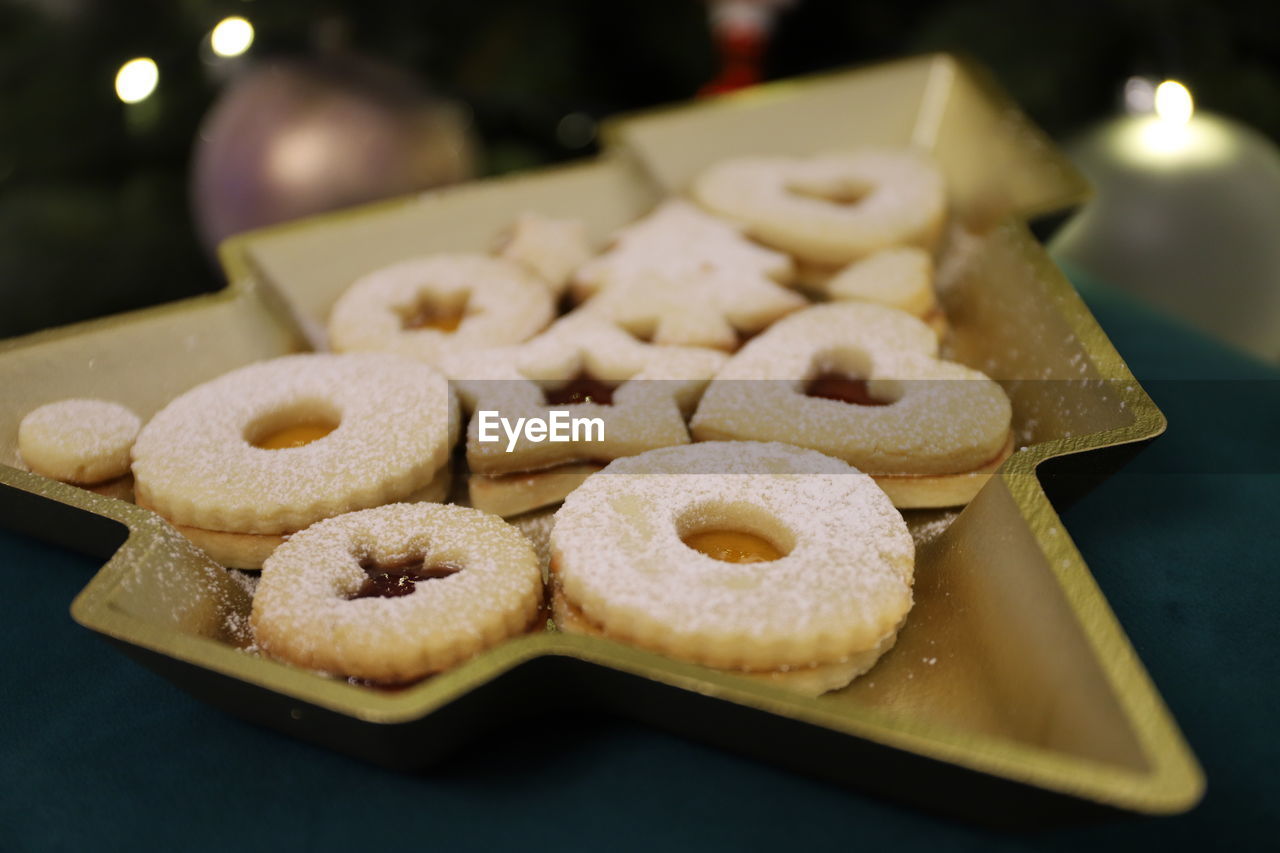 food and drink, food, sweet food, baked, freshness, cookie, christmas, celebration, sweet, no people, indoors, dessert, holiday, shape, cookies and crackers, focus on foreground, snack, tradition, close-up, temptation, sweetness, sugar, dough, still life, decoration, produce