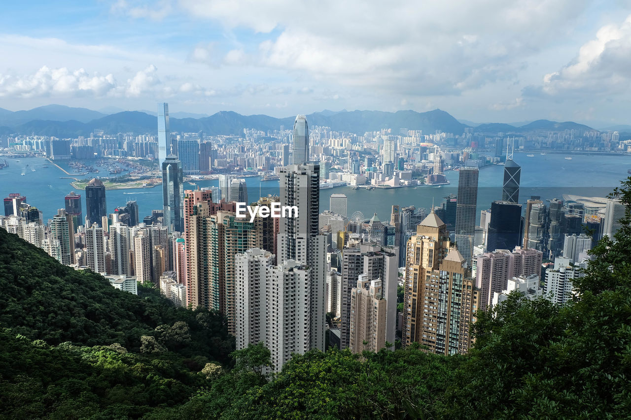 Panoramic view of city and buildings against sky