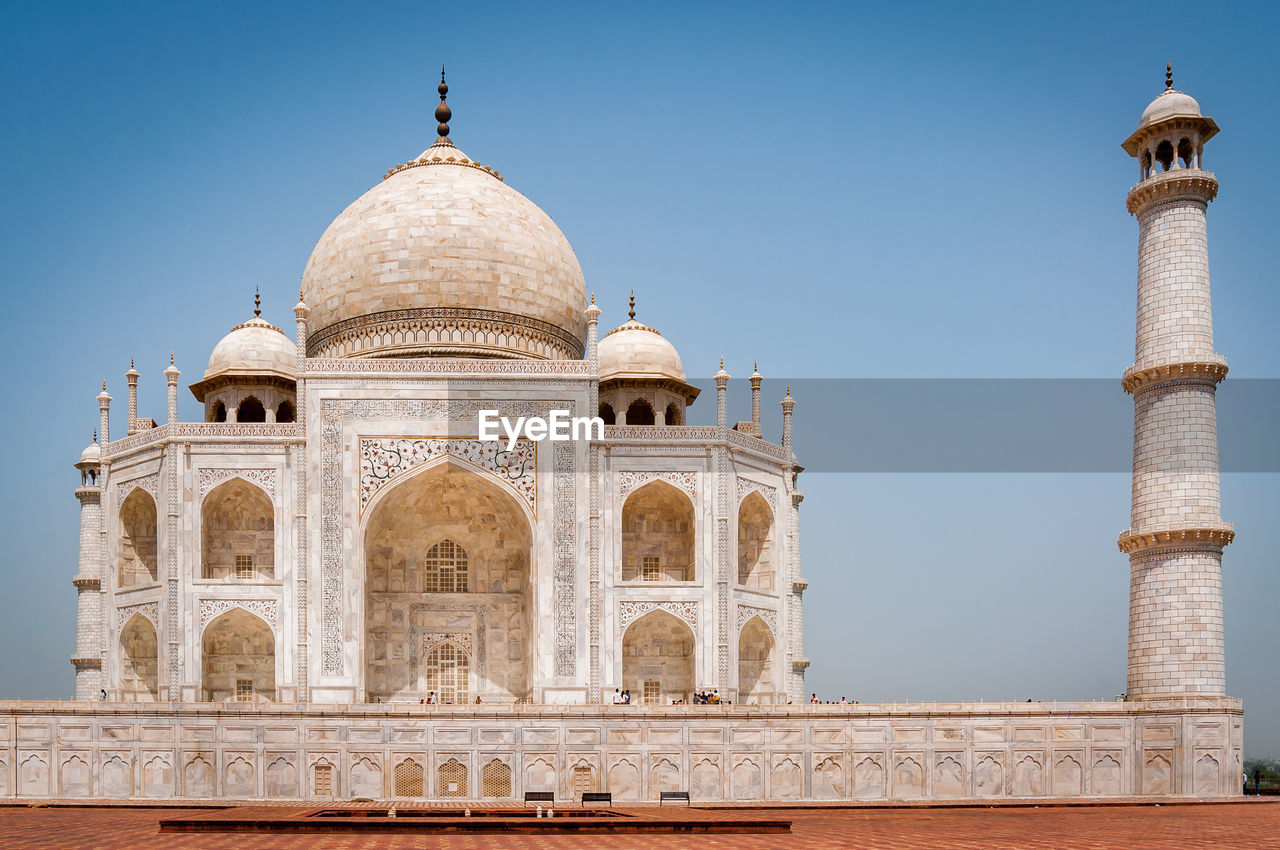 Low angle view of taj mahal against clear blue sky