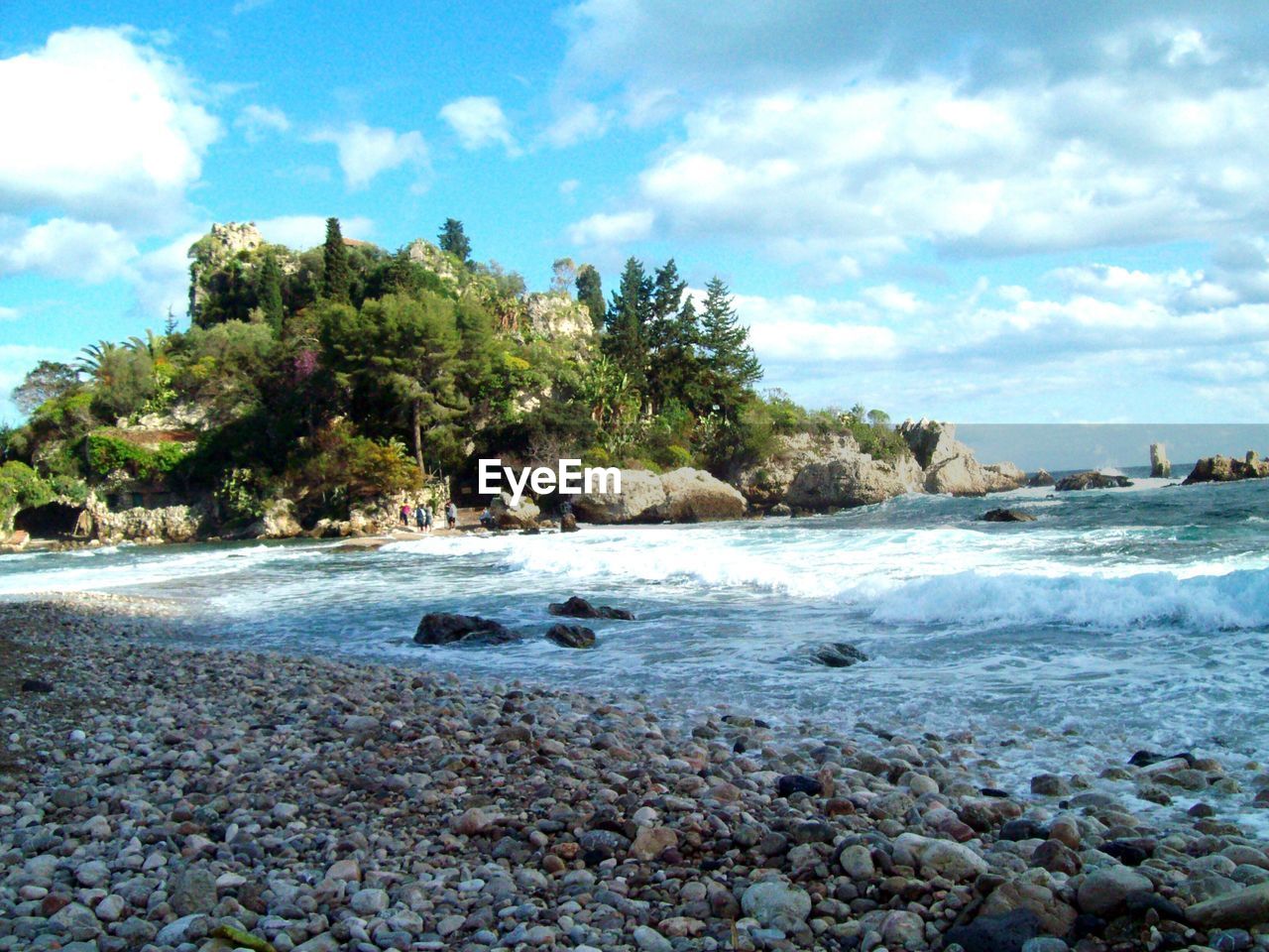 Scenic view of beach against sky