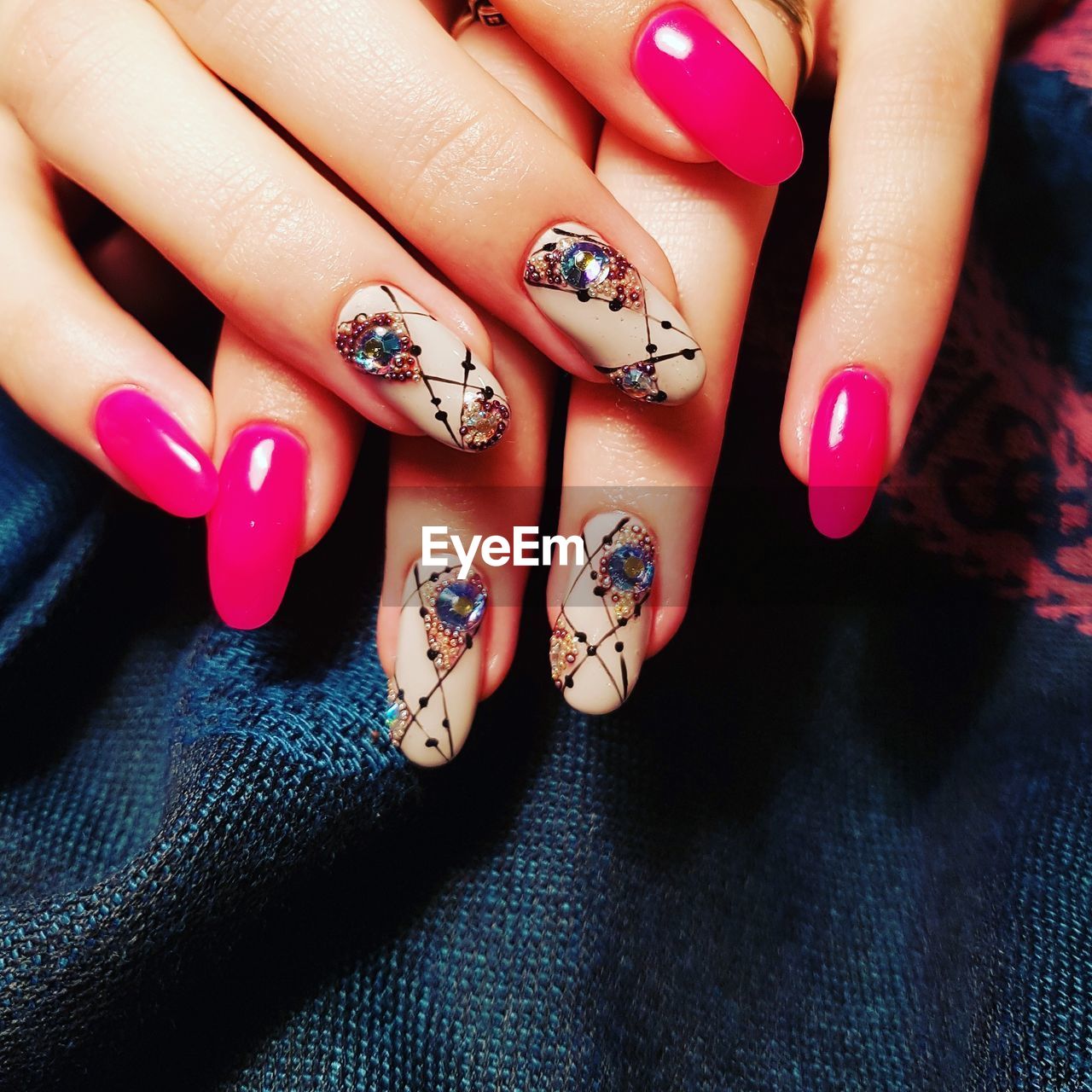 Close-up of woman fingers with nail polish