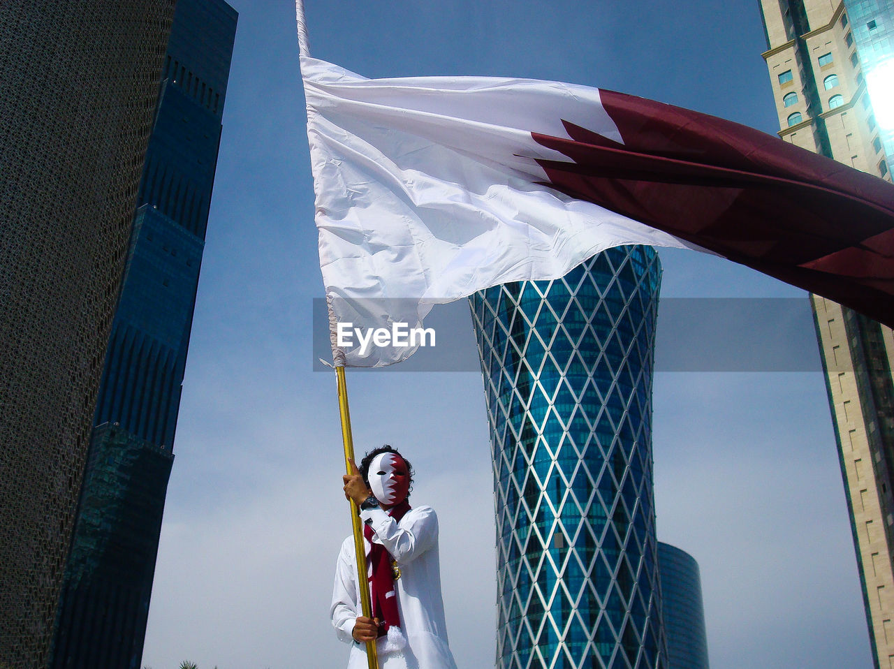 Low angle view of qatari flag
