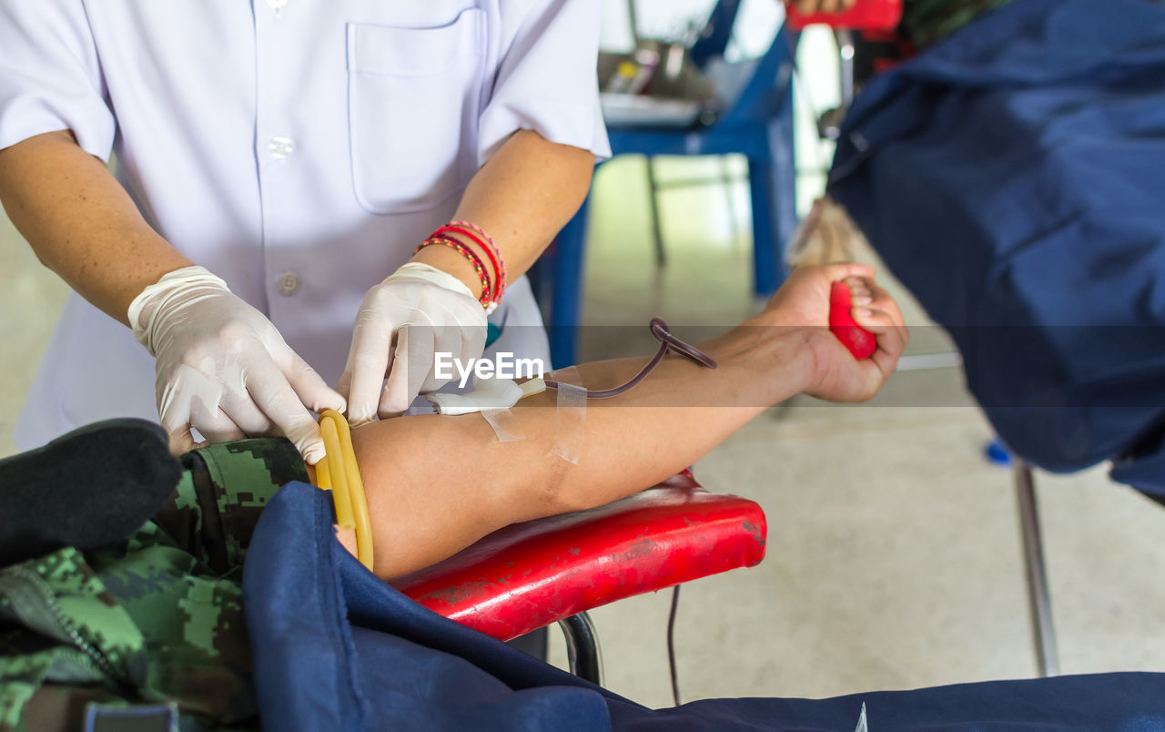 Cropped image of person during blood donation