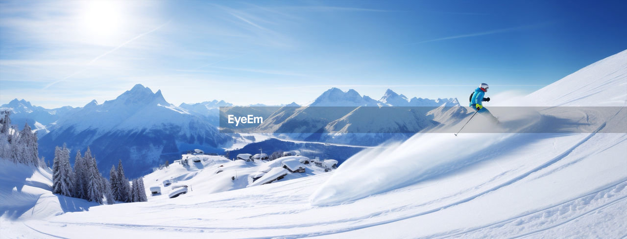 scenic view of snow covered mountains against sky