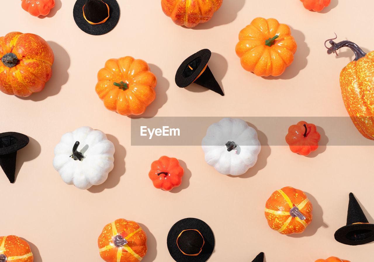 food and drink, food, pumpkin, orange color, fruit, squash, plant, healthy eating, freshness, halloween, variation, persimmon, no people, group of objects, celebration, still life, autumn, produce, large group of objects, vegetable, high angle view, studio shot, orange, wellbeing, arrangement, group