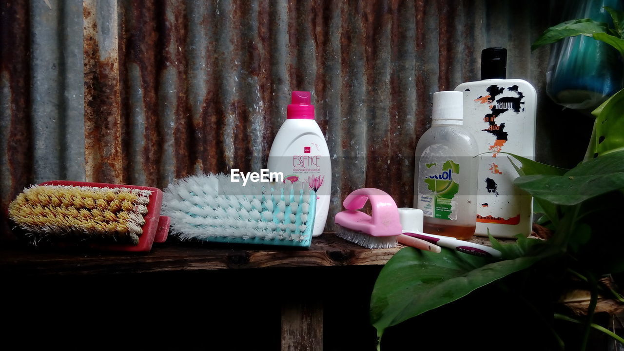 CLOSE-UP OF TOYS ON SHELF IN CONTAINER