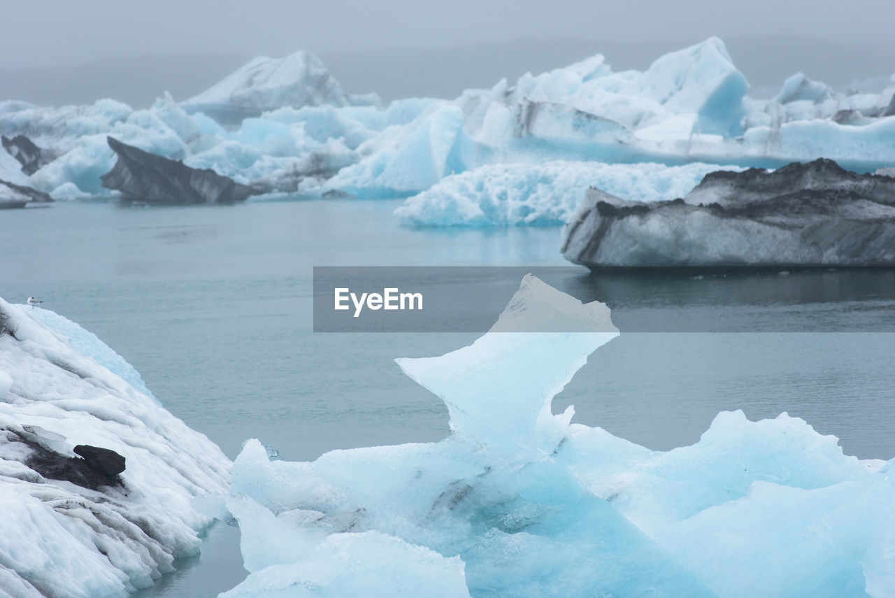 Melting icebergs as a result of global warming floating in jokulsarlon lagoon. iceland