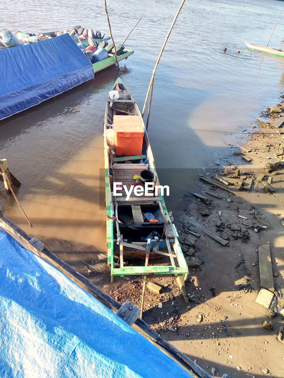 High angle view of boat moored on beach