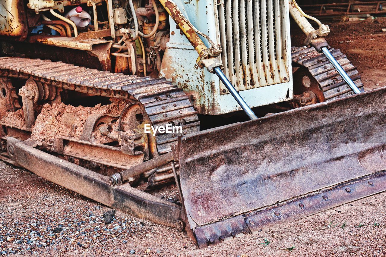 Abandoned bulldozer on land