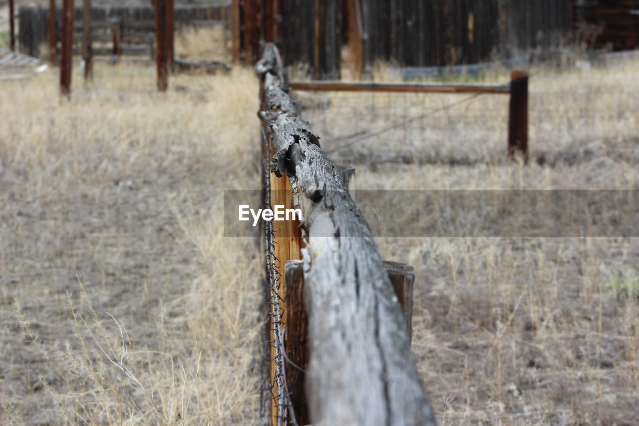 Fence on countryside landscape