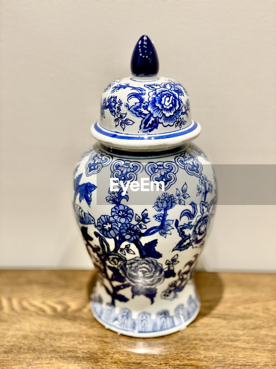 blue and white porcelain, ceramic, porcelain, craft, vase, pattern, indoors, pottery, ancient, art, history, no people, floral pattern, blue, cobalt blue, decoration, table, ornate, the past, art product, craft product, close-up, single object, container, classical style, still life, architecture
