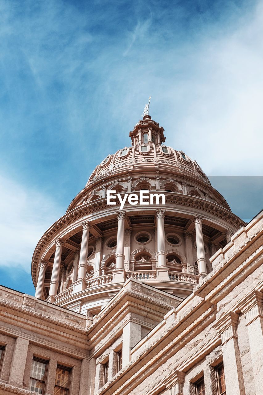 Low angle view of texas state capitol against sky