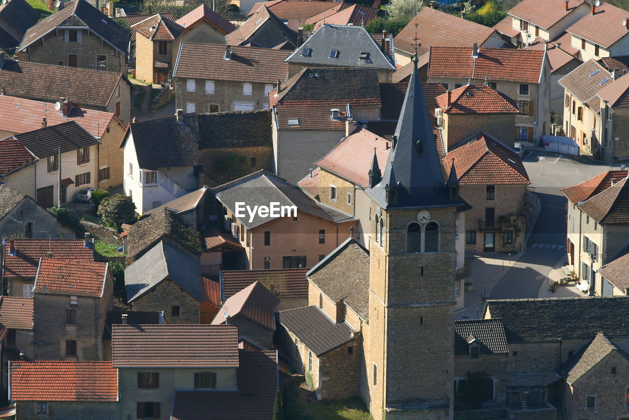 Houses in town against sky