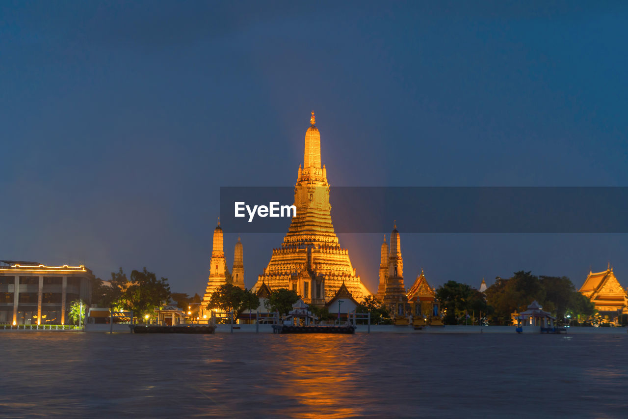 low angle view of temple against clear sky at night