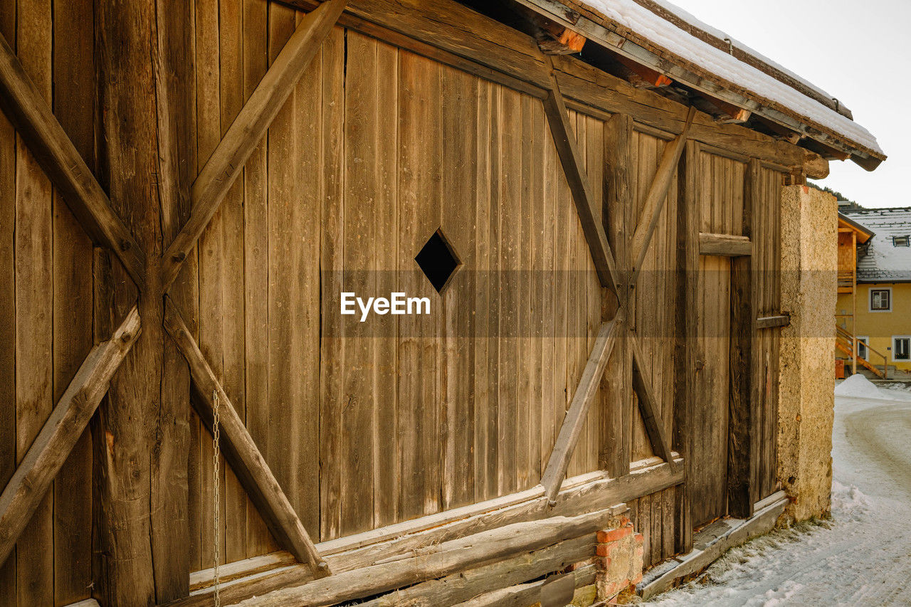 architecture, wood, built structure, building exterior, shed, log cabin, barn, house, building, lumber, shack, hut, no people, nature, residential district, snow, day, outdoors, wall, industry, winter, construction industry, landscape, home