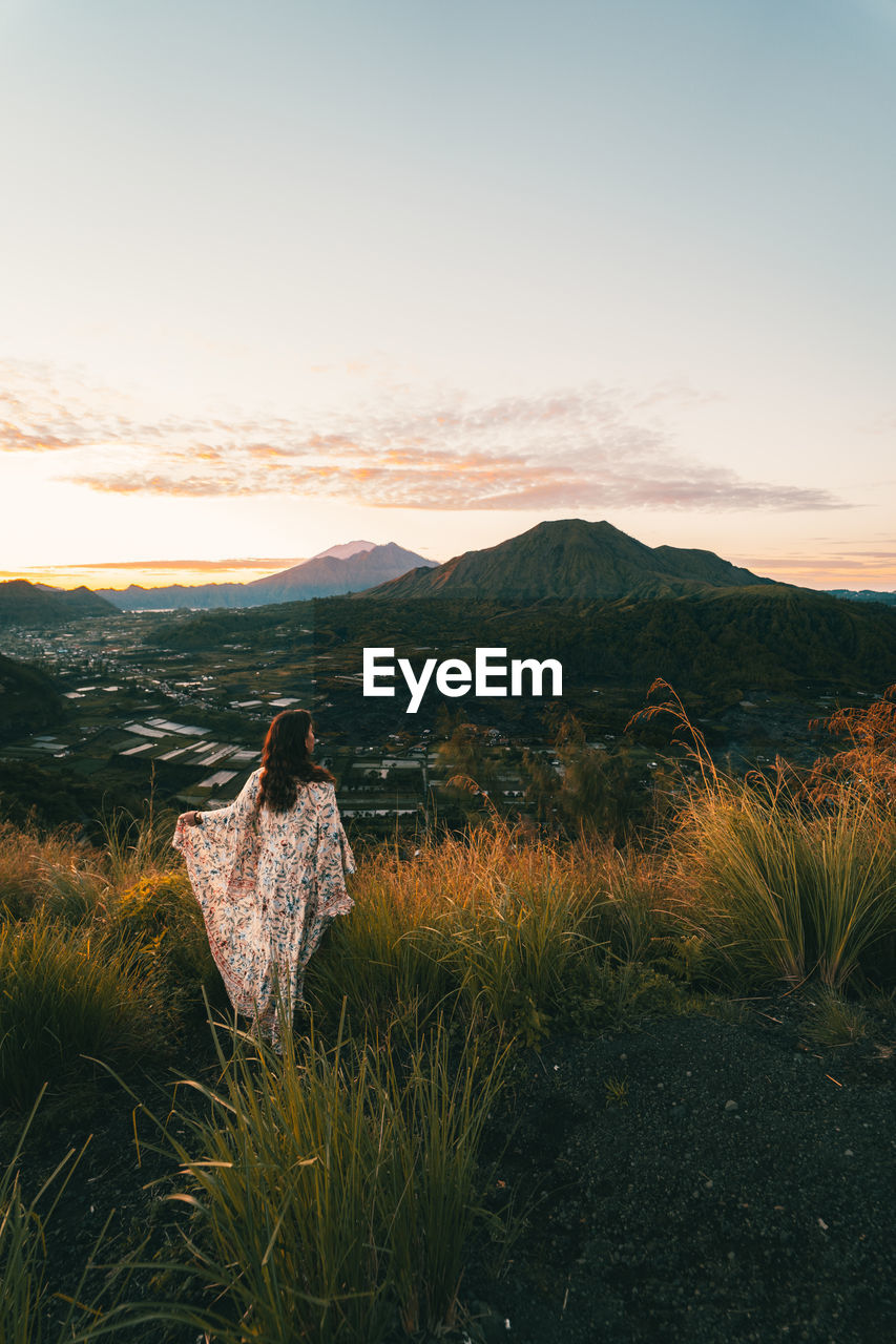 SCENIC VIEW OF LAND DURING SUNSET