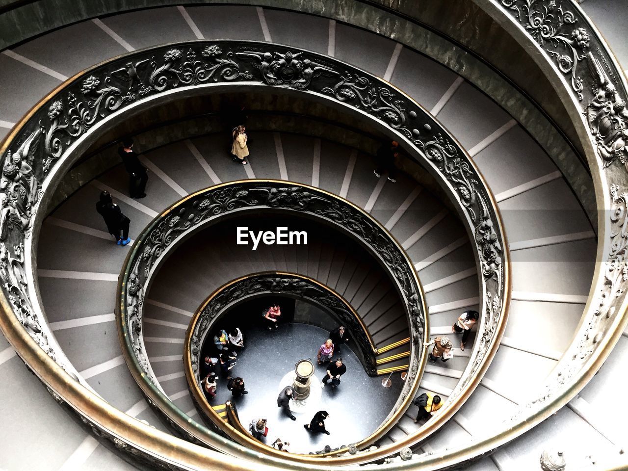 High angle view of people on spiral staircase in vatican museums