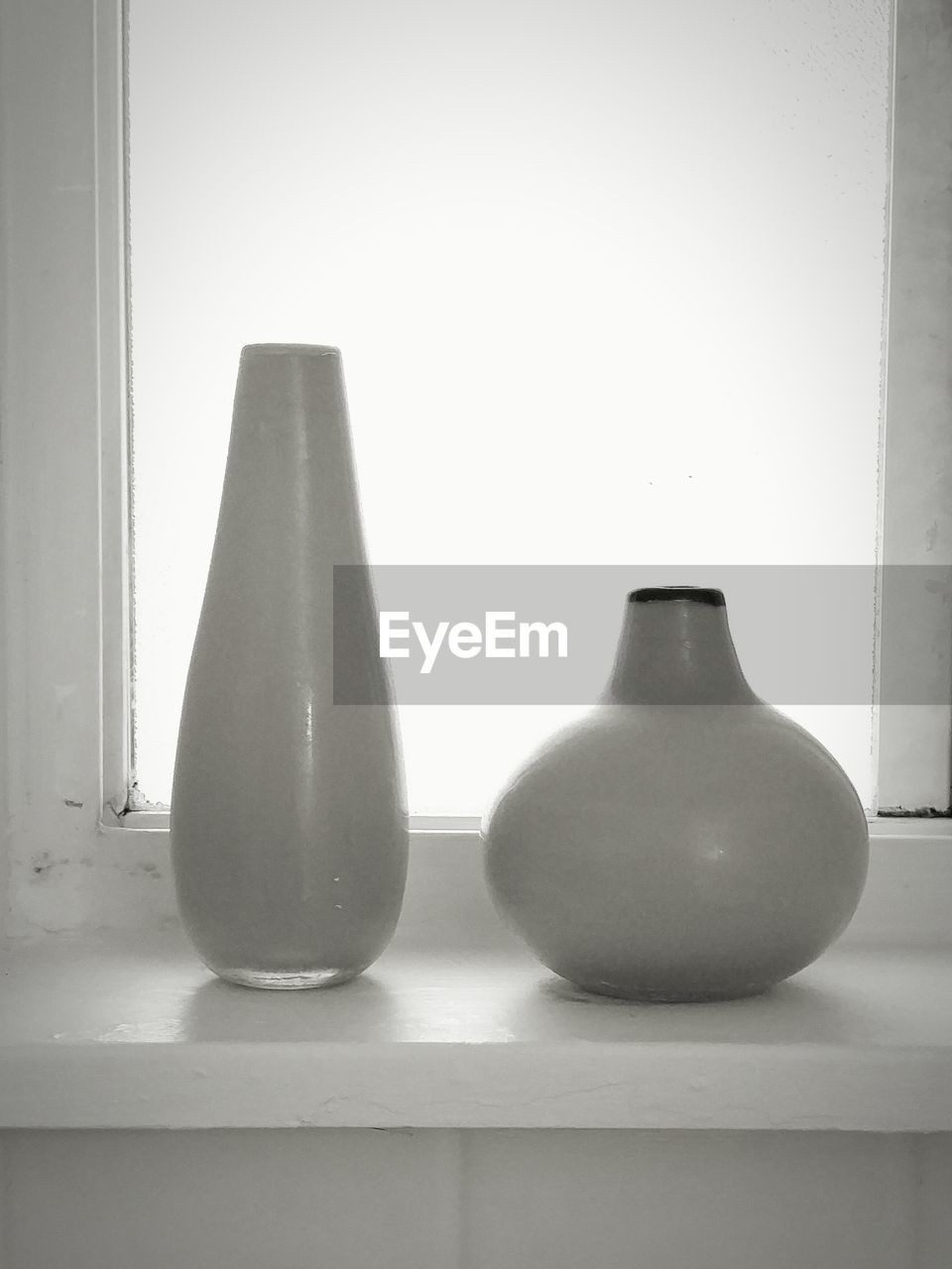 Vases on window sill