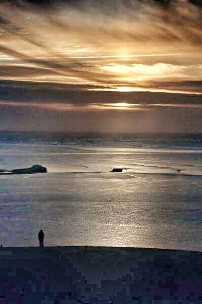 VIEW OF SEA AT SUNSET