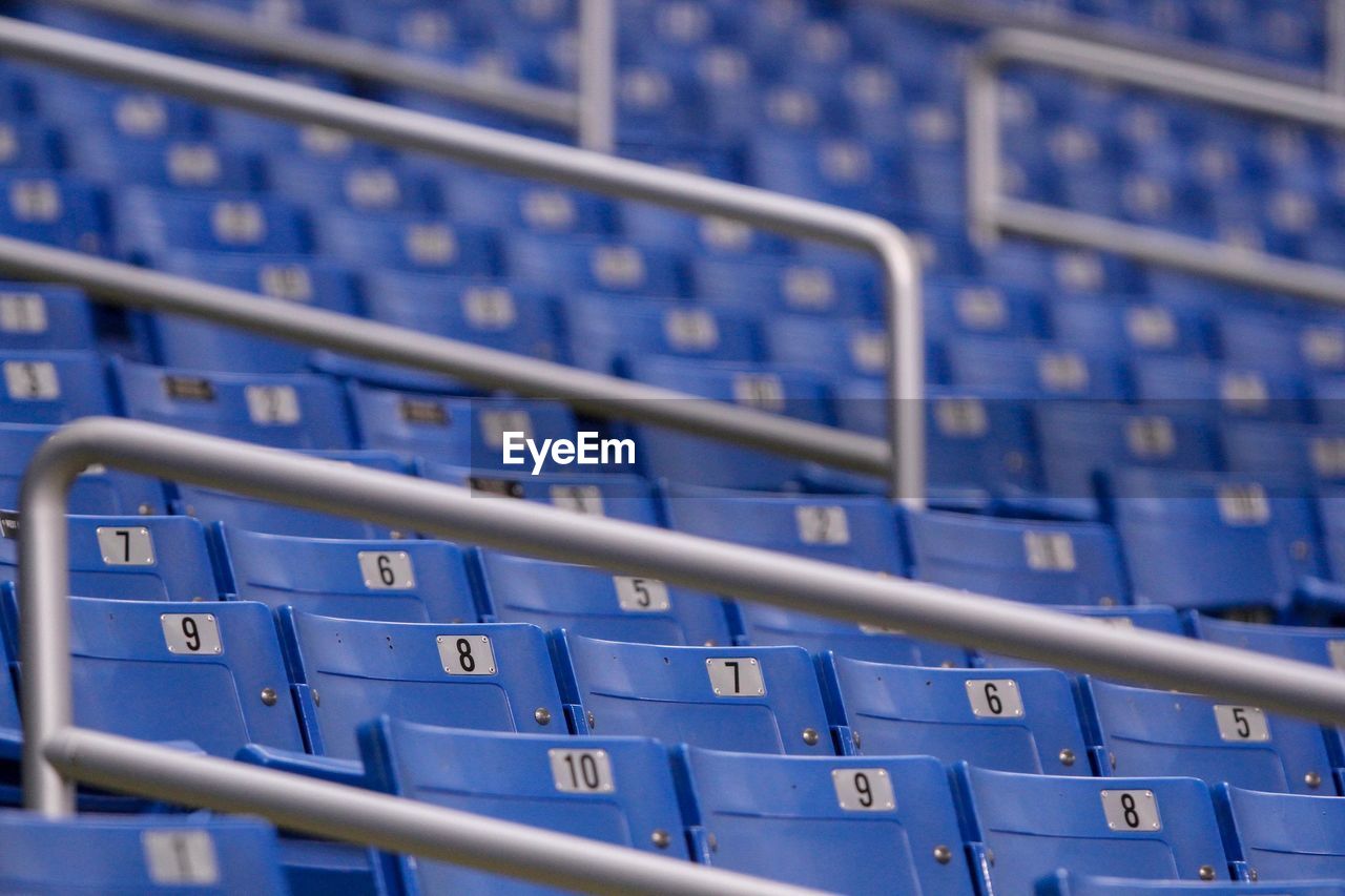 Full frame shot of blue seats at stadium