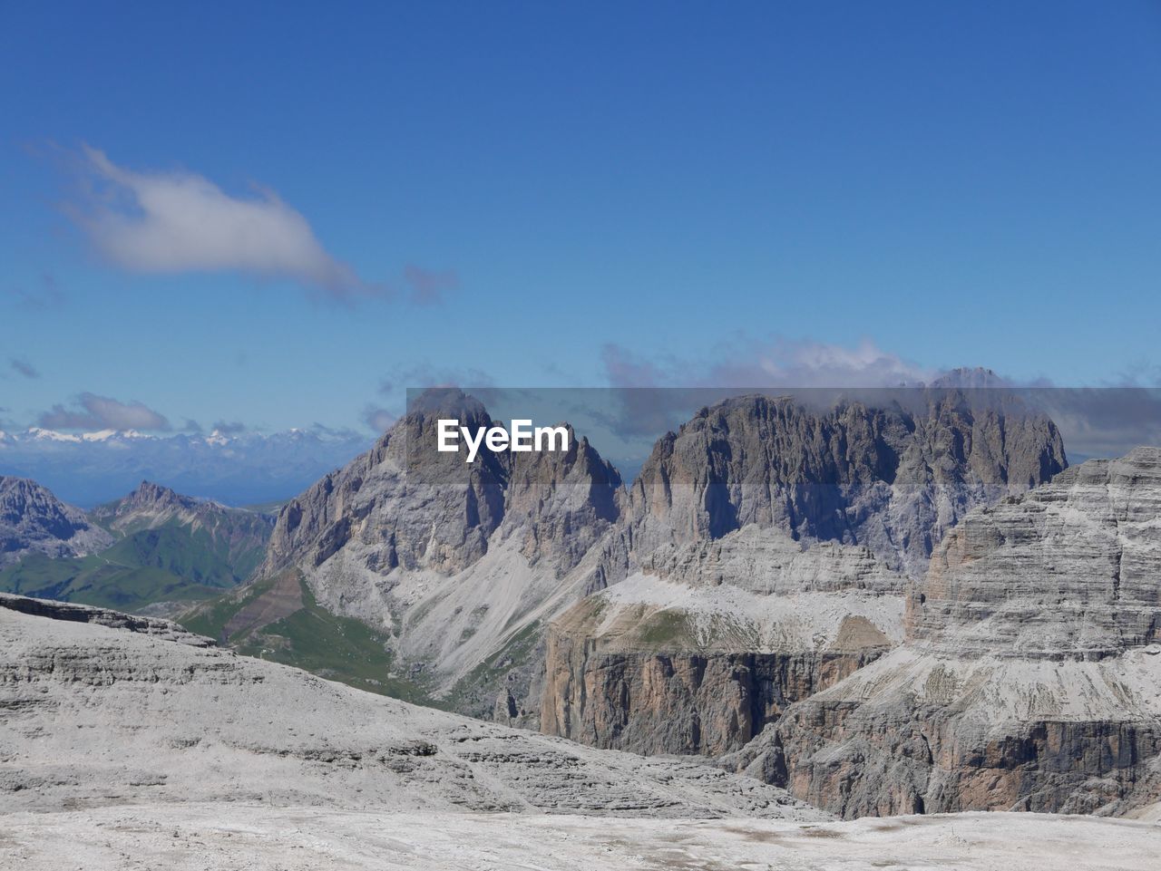 Scenic view of dolomites against blue sky