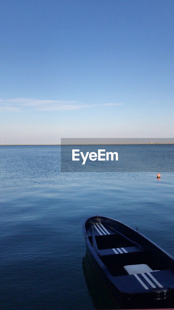 Scenic view of blue sea against sky