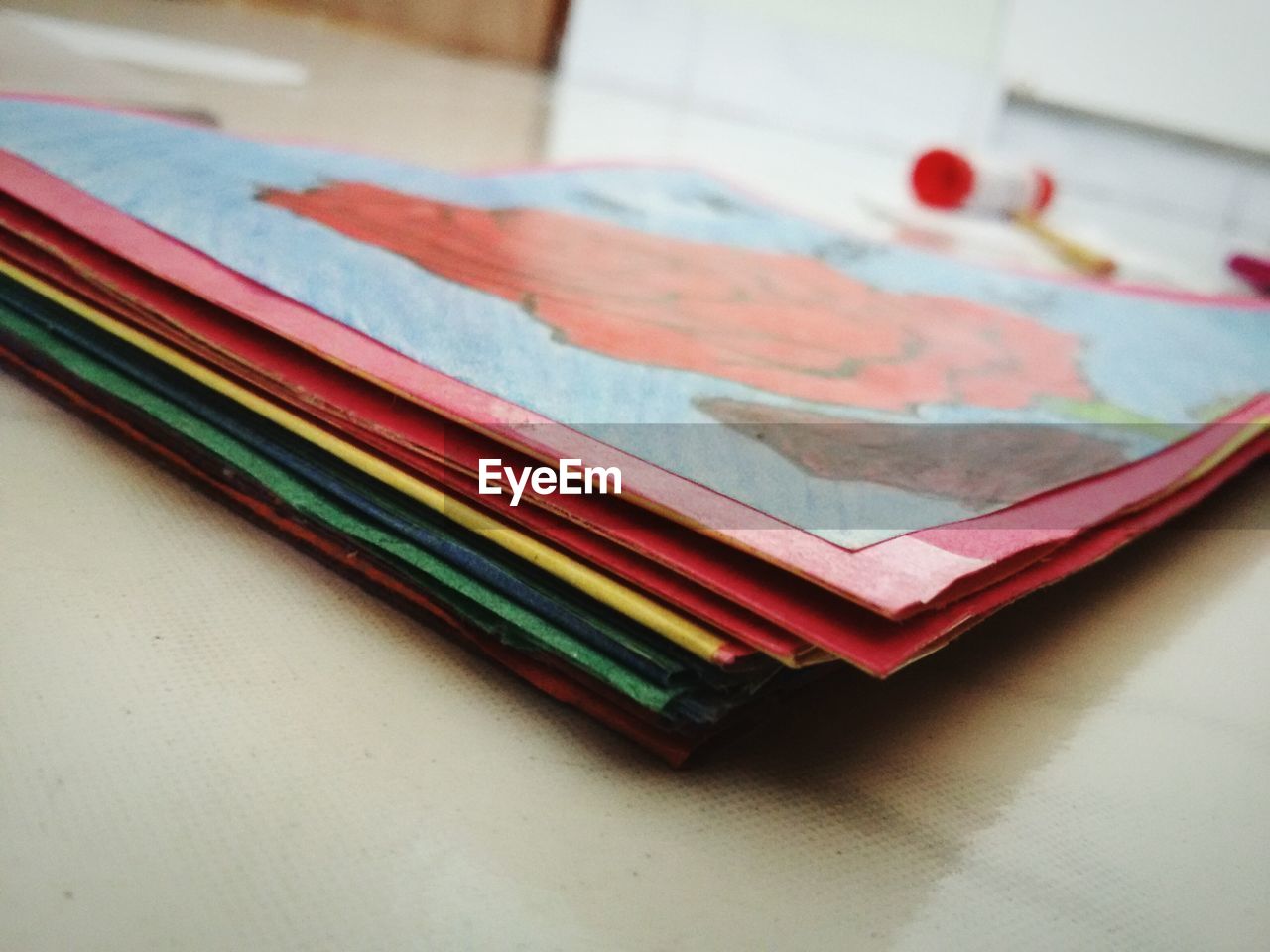 Close-up of multi colored files on table
