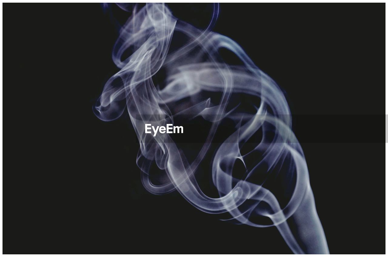 Smoke against black background