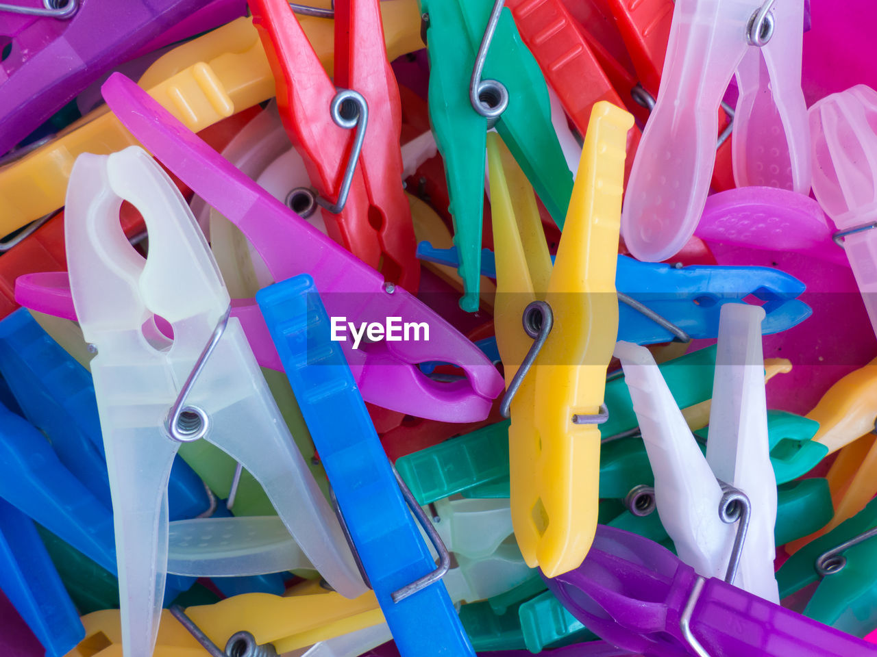 FULL FRAME SHOT OF MULTI COLORED TOYS IN PLASTIC